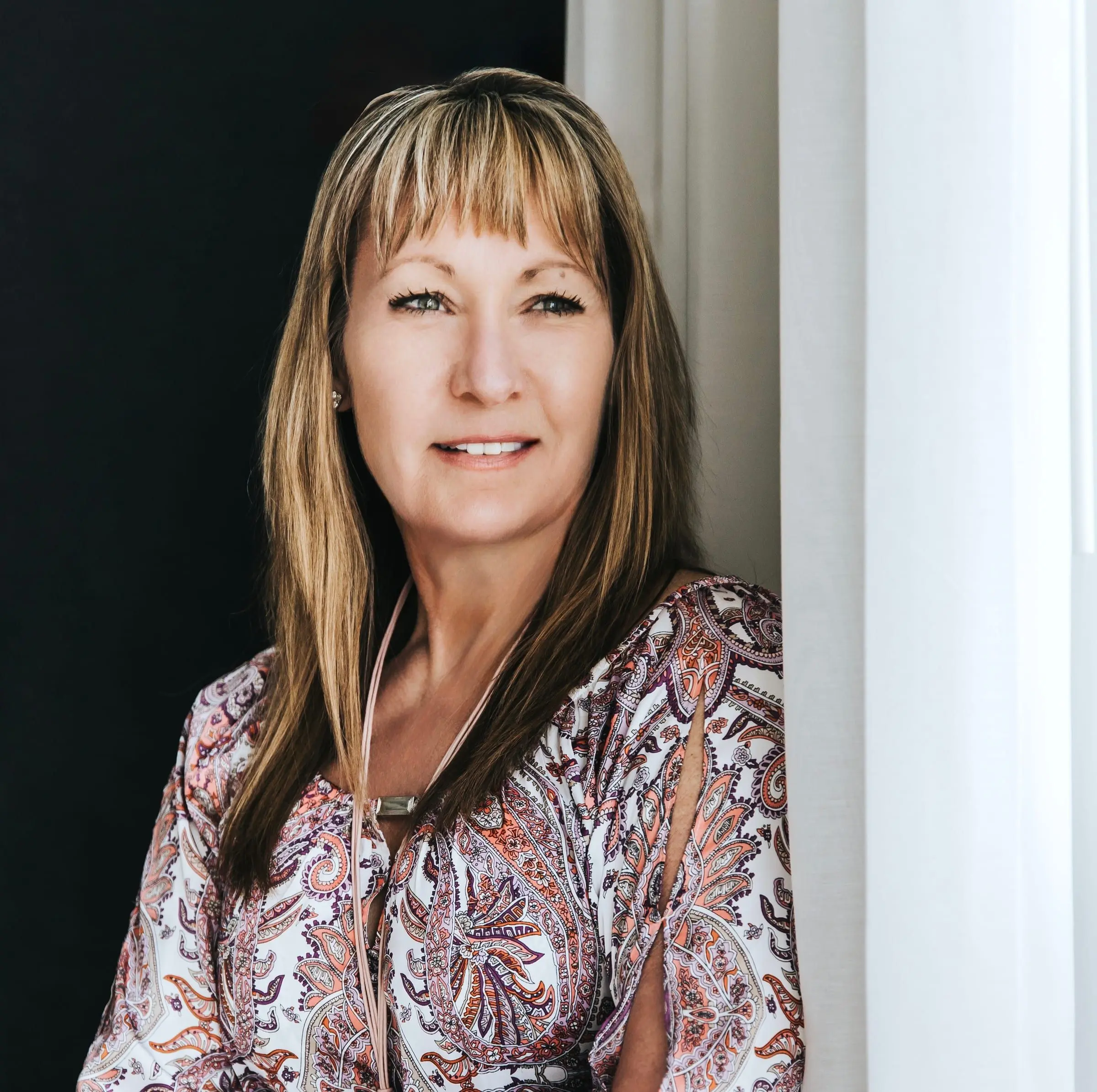 Debra, founder and principal designer at Chelburg Cabinetry